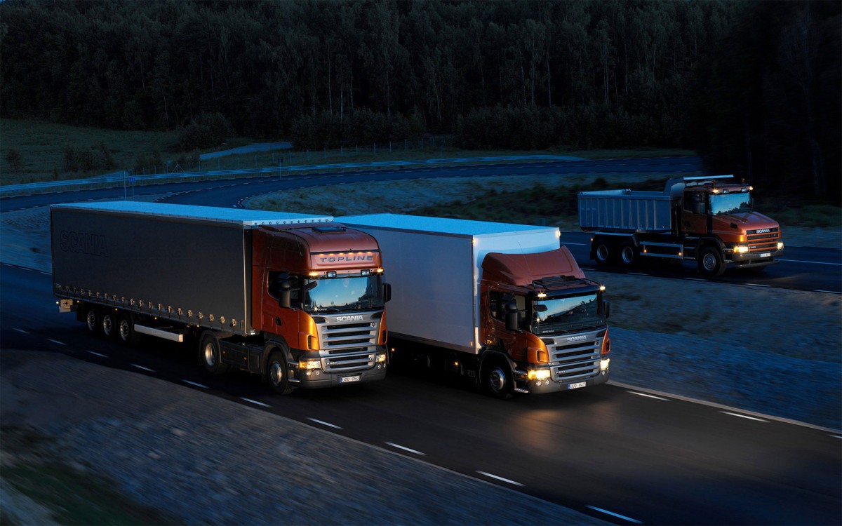 Three-orange-Scania-trucks-1200x750.jpg